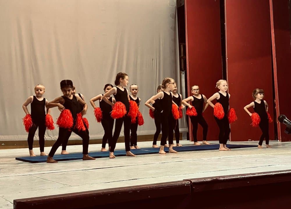 Junior dancers with pom-poms