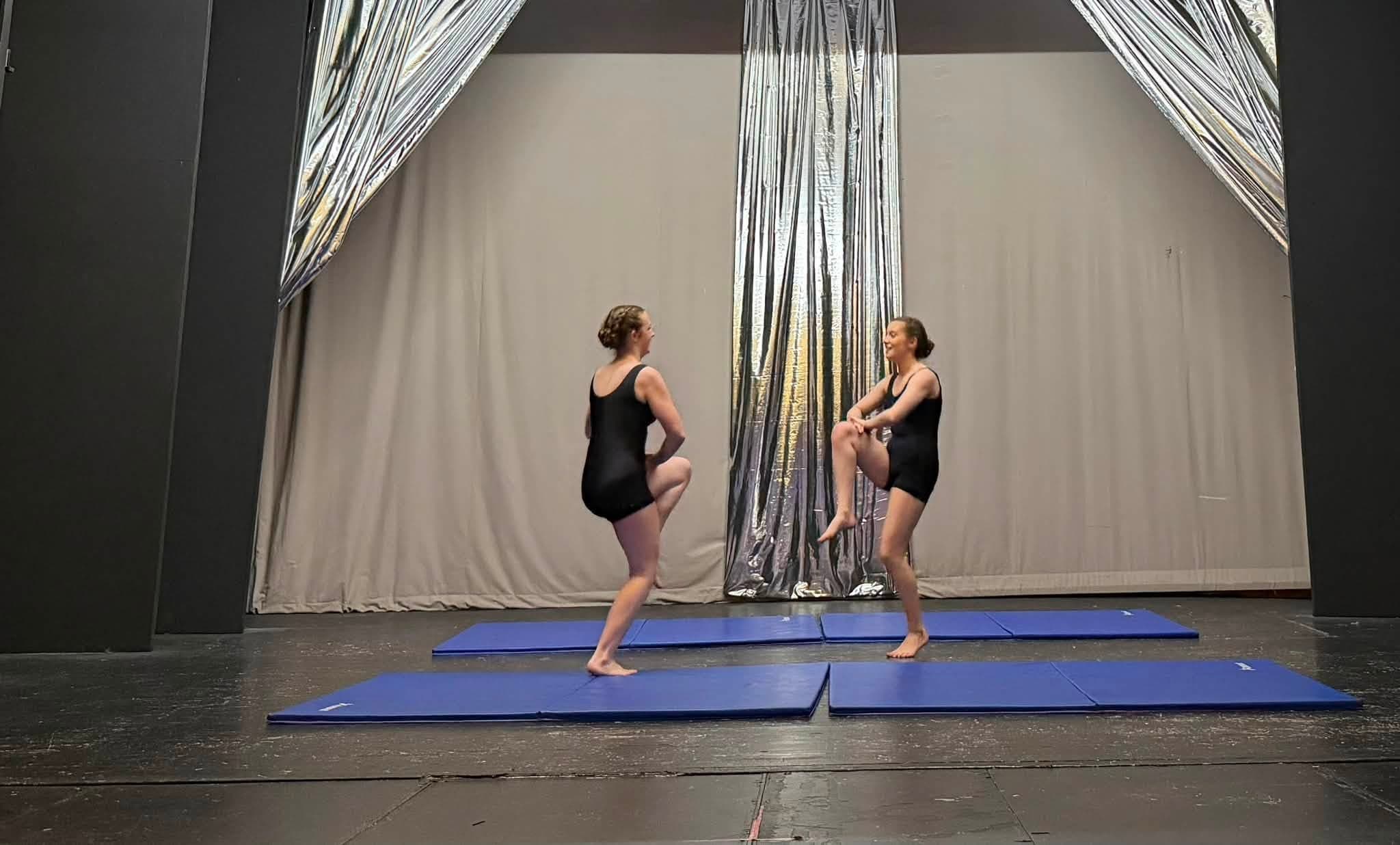 Gymnastic dance pair on stage